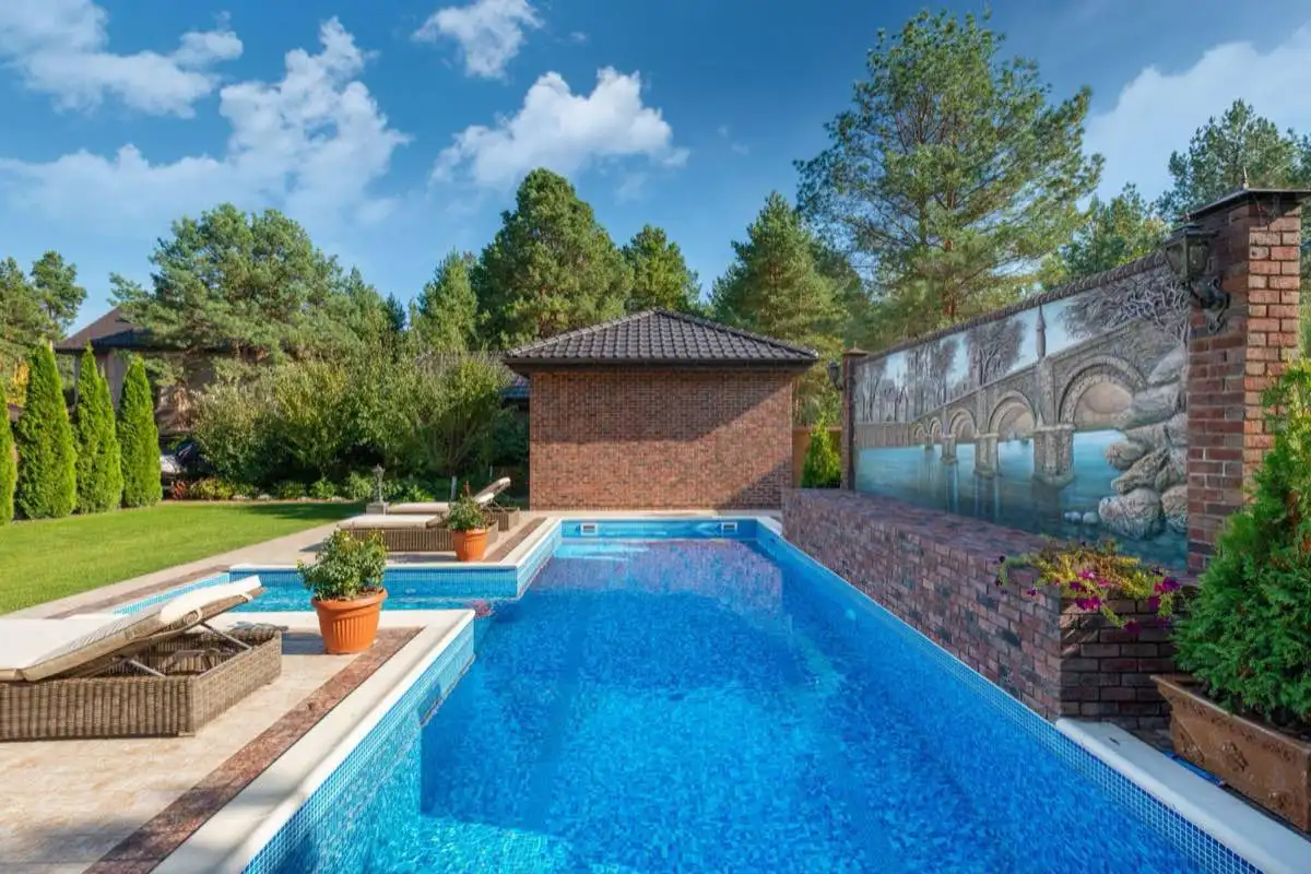 Backyard saltwater swimming pool in Albuquerque, NM on a clear day